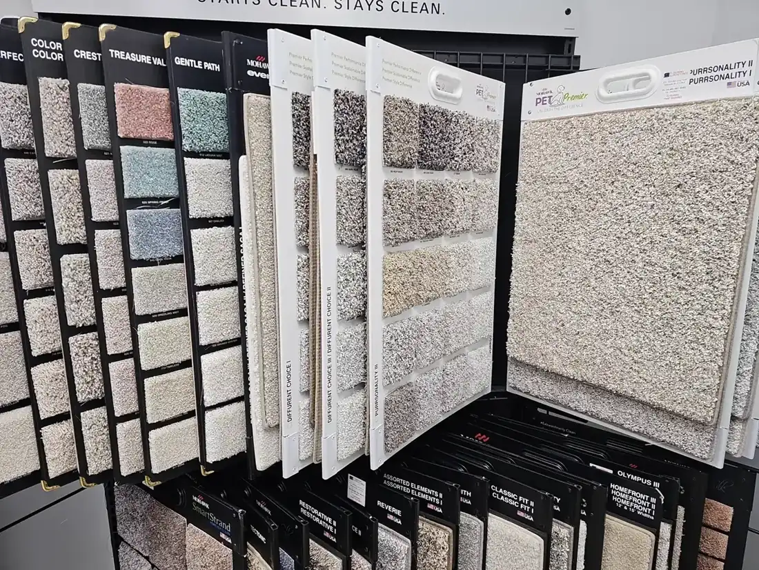 Mohawk and Phenix carpet sample boards in our showroom